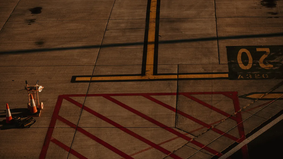 How to Mark Utility Lines Before Digging a Trench Painted utility-style markings on pavement